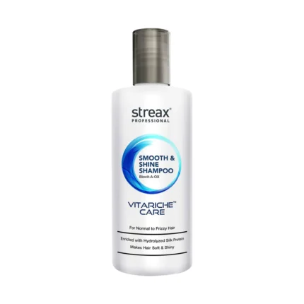 Dreaming of smooth, frizz-free, and radiant hair? Make it a reality with Streax Professionals Vitariche Care Smooth & Shine Shampoo! This deeply nourishing shampoo, specifically formulated for dry & frizzy hair, tackles dryness and frizz at its core for hair that's beautifully smooth, manageable, and full of shine. Unleash the power of: Biovit-A-OX: A unique blend of Biotin & antioxidant-rich Vitamins B5 & E for intense nourishment & protection. Hydrolyzed silk proteins: Smooths hair texture & adds radiant shine. Gentle cleansing agents: Effectively remove dirt & build-up without stripping essential moisture. Say goodbye to: Dryness & roughness Unmanageable frizz & flyaways Dullness & lack of shine Embrace: Salon-worthy smoothness & shine Deep hydration & lasting nourishment Improved manageability & effortless detangling Healthy, radiant hair in any weather Perfect for: Dry & frizzy hair Chemically treated or heat-styled hair Anyone seeking smooth, manageable, and healthy hair How to use: Massage shampoo into wet hair, focusing on the scalp and roots. Work into a rich lather and rinse thoroughly. For optimal results, follow with Streax Professionals Vitariche Care Smooth & Shine Conditioner. Pro tip: Use regularly for best results. Pair with the entire Vitariche Care Smooth & Shine range for a complete frizz-fighting & nourishing hair care routine. Invest in your hair's health with Streax Professionals Vitariche Care Smooth & Shine Shampoo! This affordable, salon-quality shampoo delivers transformative results, leaving you with smooth, manageable, and radiantly beautiful hair. Additional benefits: Dermatologically tested Suitable for color-treated hair Free from harsh chemicals & sulfates Available in various sizes to suit your needs Order your Streax Professionals Vitariche Care Smooth & Shine Shampoo today and unlock the secrets to smooth, frizz-free, and healthy hair!